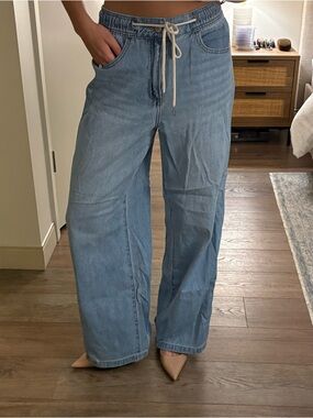 Flying angel drawstring jeans
